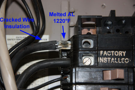 The Heat produced by Loose Electrical Connection has Cracked the Wire Insulation 
                  					and is starting to melt the aluminum conductor