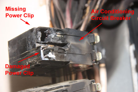 The Loose Circuit Breaker Connection Melted the Top Circuit Breaker Power Clip
                        				 and Damaged the Bottom Circuit Breaker Power Clip