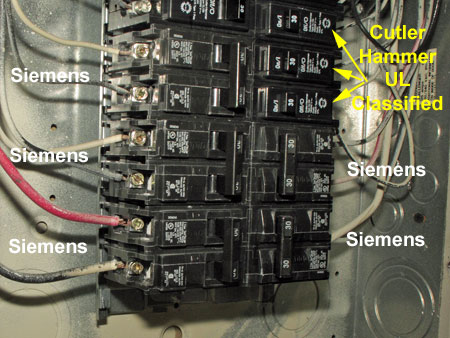 Three brands of circuit breakers in the same panel box