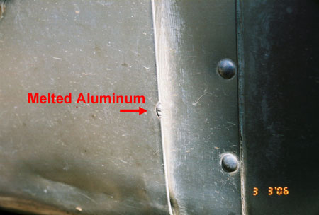Exit Point - Melted Aluminum on Edge Waste Tank Door