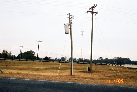 Air Gap Lightning Arrestors Along Three-Phase Distribution Line